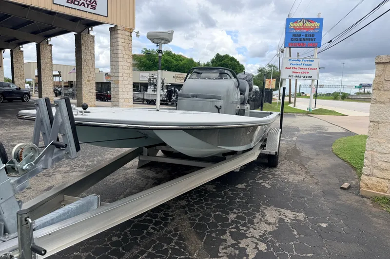 Slide: The Image of 2018 SCB Stingray boat on trailer at dealership, South Austin Marine. - 4