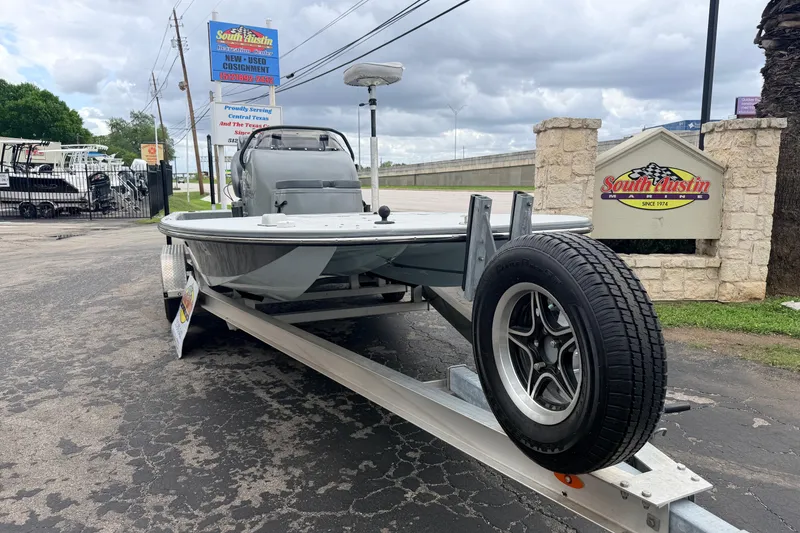 Slide: The Image of 2018 SCB Stingray boat on trailer at South Austin Marine dealership. - 5