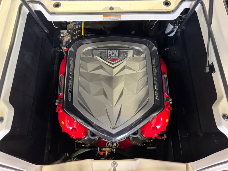 Slide: The Image of Engine compartment of 2016 Nautique Super Air Nautique G23 boat. - 28
