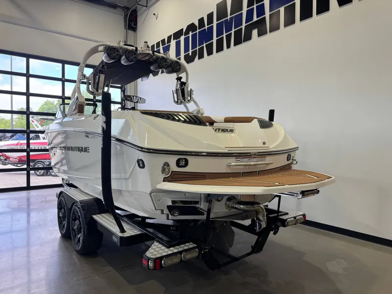 Slide: The Image of 2016 Nautique Super Air Nautique G23 boat in showroom. - 5