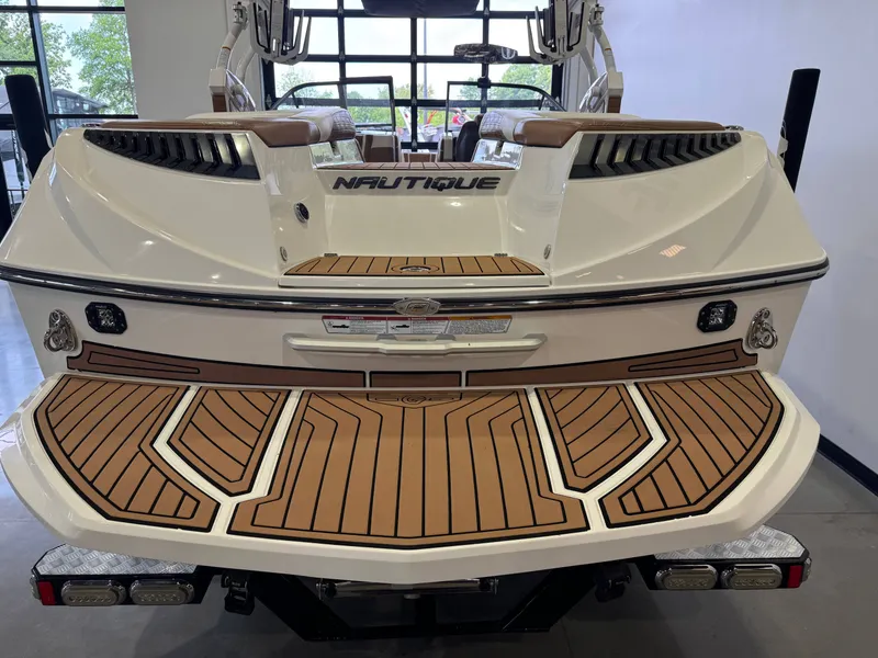 Slide: The Image of Rear view of a 2016 Nautique Super Air Nautique G23 boat. - 8