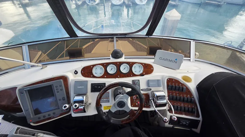 Slide: The Image of 2004 Meridian 459 Motoryacht helm with Garmin navigation system. - 16