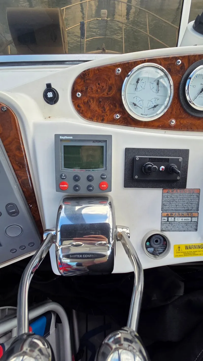 Slide: The Image of 2004 Meridian 459 Motoryacht helm with navigation instruments. - 18