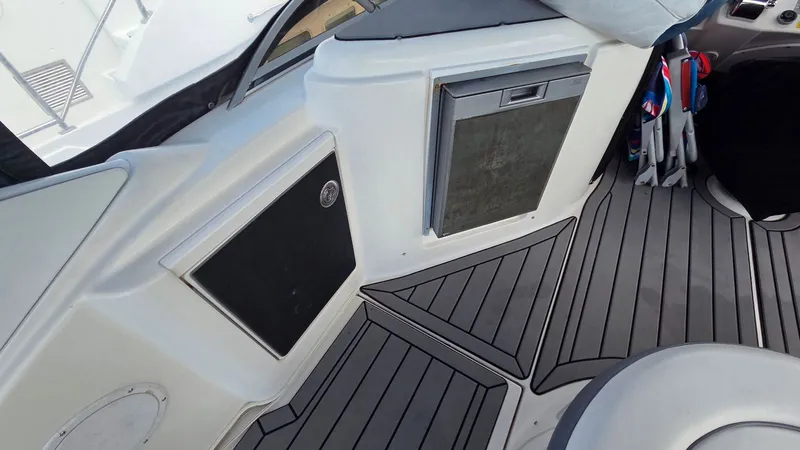 Slide: The Image of Interior of a 2004 Meridian 459 Motoryacht with gray flooring. - 24