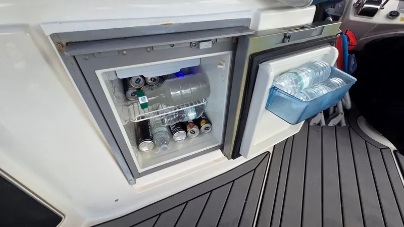 Slide: The Image of Fridge on Meridian 459 Motoryacht, stocked with beverages. - 25