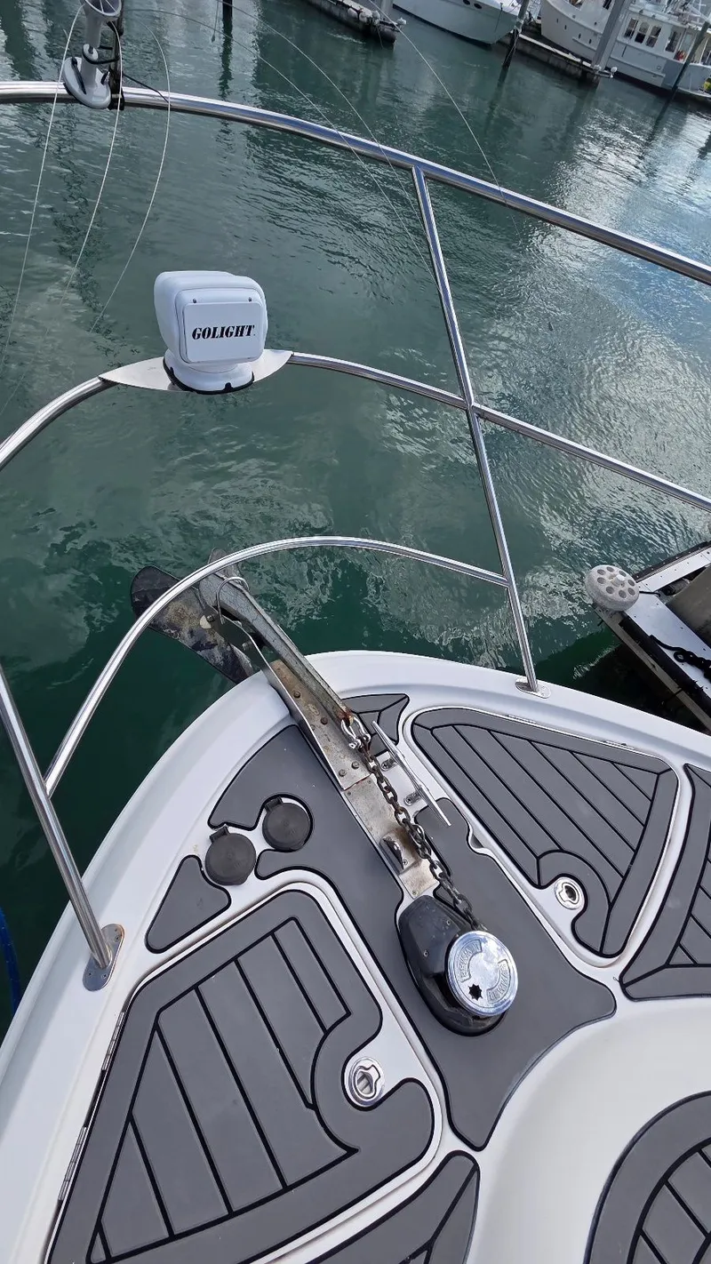 Slide: The Image of Bow view of a 2004 Meridian 459 Motoryacht at dock. - 26