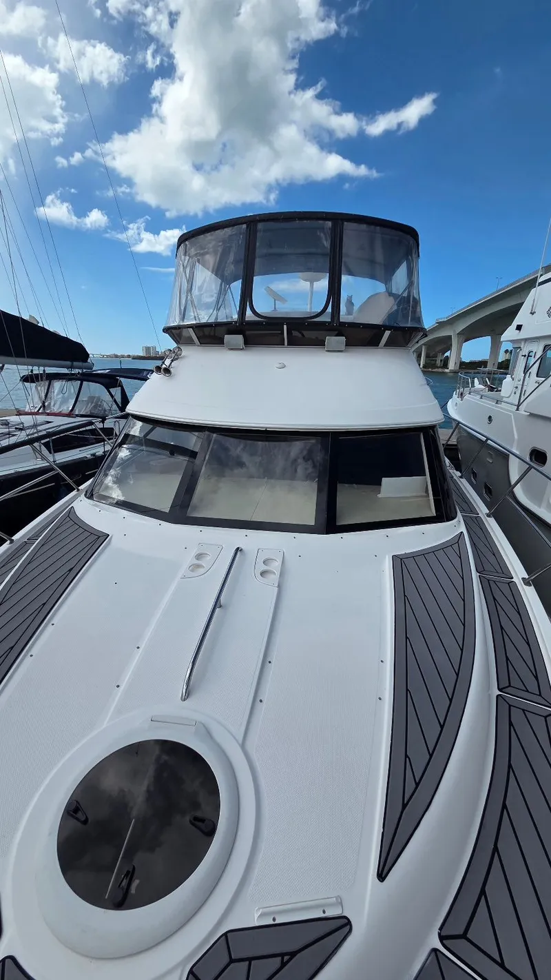 Slide: The Image of Meridian 459 Motoryacht 2004 docked under blue sky. - 27