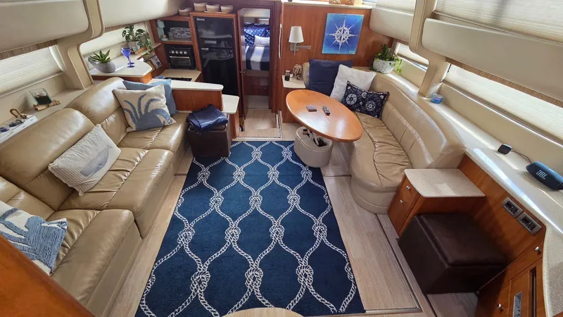Slide: The Image of Interior of a 2004 Meridian 459 Motoryacht with elegant furnishings. - 32
