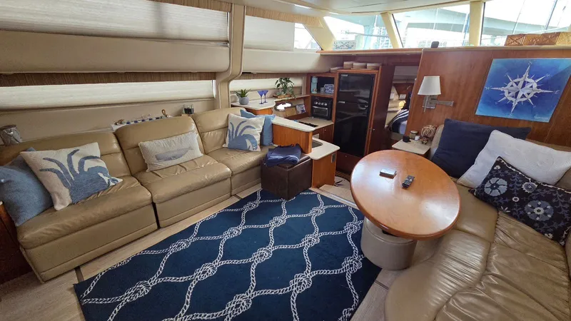 Slide: The Image of Interior of 2004 Meridian 459 Motoryacht with leather sofas and nautical decor. - 33
