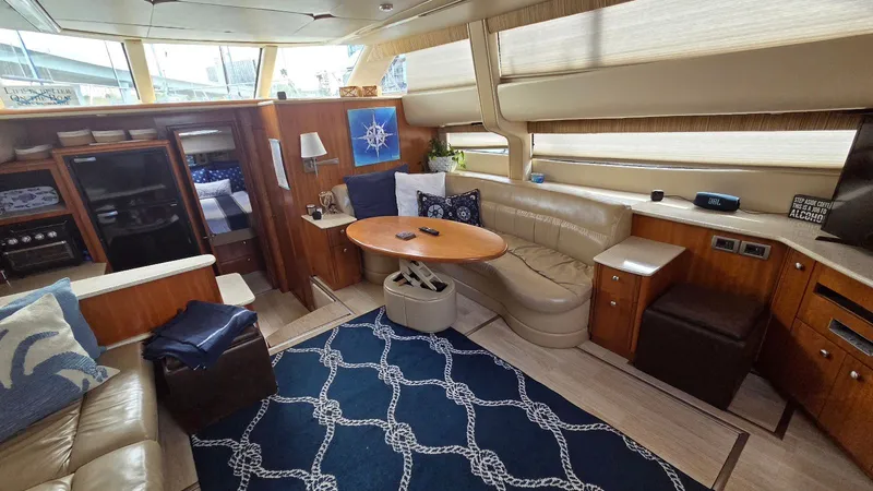 Slide: The Image of Interior of a 2004 Meridian 459 Motoryacht with elegant furnishings. - 34