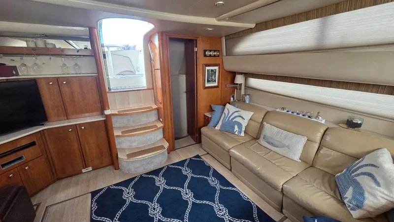 Slide: The Image of Interior of a 2004 Meridian 459 Motoryacht with sofa and stairs. - 35