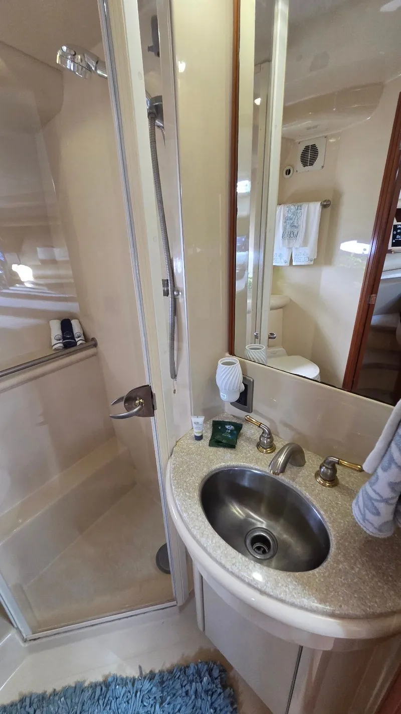Slide: The Image of 2004 Meridian 459 Motoryacht bathroom with shower and sink. - 45