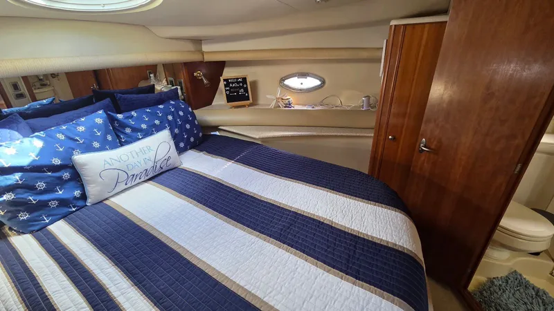 Slide: The Image of Interior of 2004 Meridian 459 Motoryacht featuring cozy bedroom. - 47