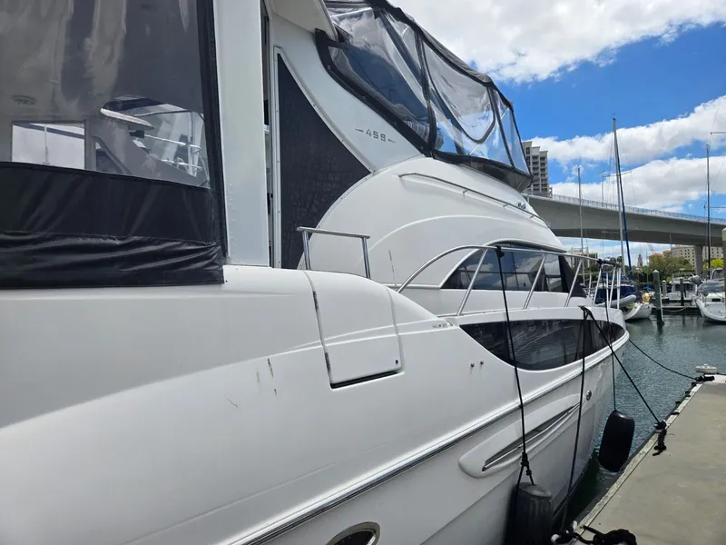 Slide: The Image of 2004 Meridian 459 Motoryacht docked at marina. - 7