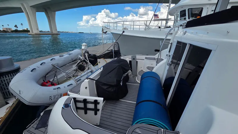 Slide: The Image of 2004 Meridian 459 Motoryacht docked with inflatable boat. - 9