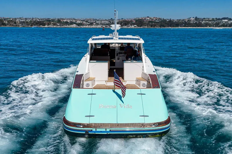 Slide: The Image of Spacious deck of 2007 True North 38 boat with teak flooring and ocean backdrop. - 15