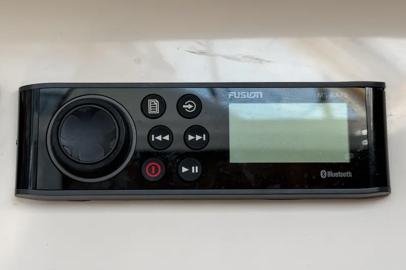 Slide: The Image of Fusion MS-RA70 Bluetooth marine stereo system on a True North 38, 2007 model. - 50