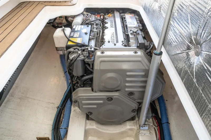 Slide: The Image of Engine compartment of a 2007 True North 38 boat, showcasing detailed mechanical components. - 57