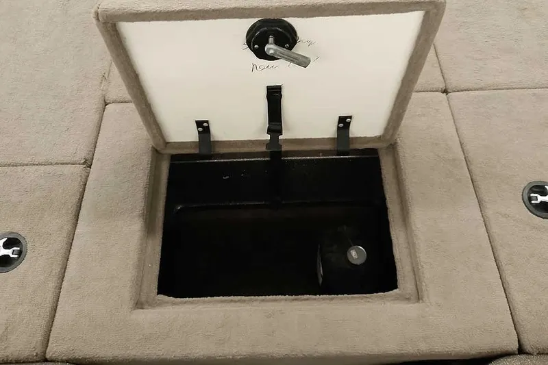 Slide: The Image of Open storage compartment on 2003 Ranger 521DVX Comanche boat deck. - 14