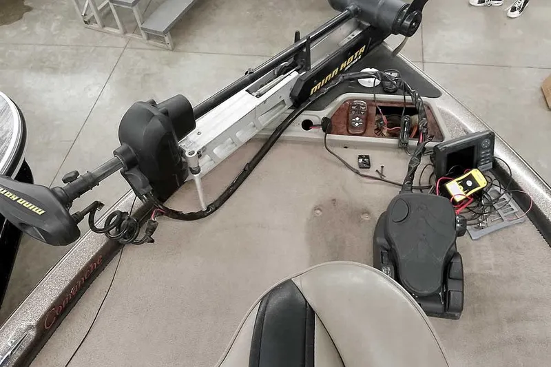 Slide: The Image of 2003 Ranger 521DVX Comanche boat deck with trolling motor and electronic equipment. - 21