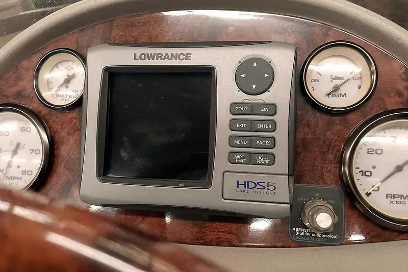 Slide: The Image of Dashboard of a 2003 Ranger 521DVX Comanche with Lowrance HDS5 display and gauges. - 29