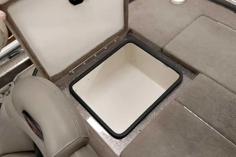 Slide: The Image of Open storage compartment in 2003 Ranger 521DVX Comanche boat interior. - 35