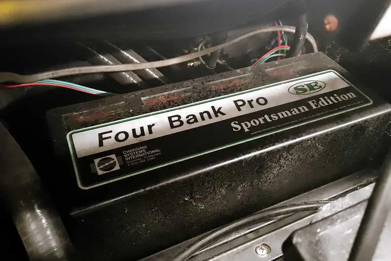 Slide: The Image of Four Bank Pro Sportsman Edition battery charger in 2003 Ranger 521DVX Comanche. - 37