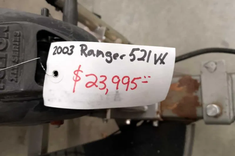 Slide: The Image of Price tag for 2003 Ranger 521DVX Comanche, listed at $23,995. - 5