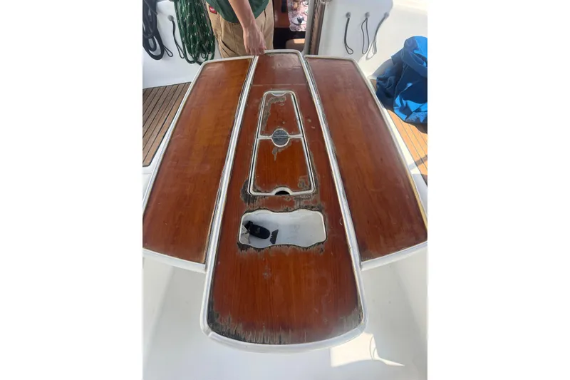 Slide: The Image of Worn wooden deck of a 2009 Beneteau Oceanis 40 sailboat. - 24