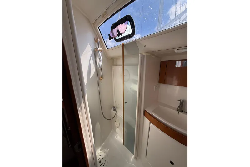 Slide: The Image of Bathroom interior of 2009 Beneteau Oceanis 40 yacht, featuring shower and sink. - 45