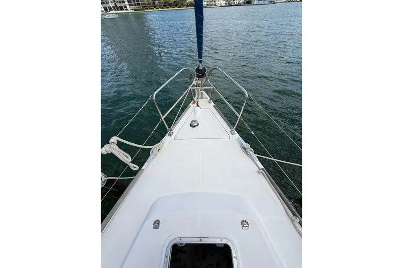 Slide: The Image of Bow view of 2009 Beneteau Oceanis 40 sailboat on calm water. - 61