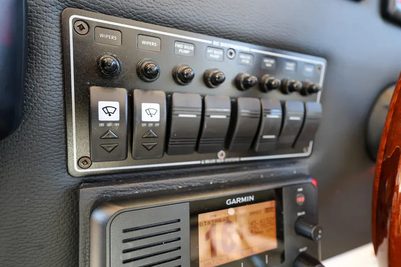 Slide: The Image of Control panel of a 2019 Cutwater C-302 Coupe boat with Garmin navigation system. - 15