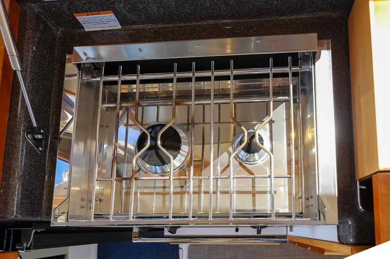 Slide: The Image of Stainless steel stove in 2019 Cutwater C-302 Coupe boat kitchen. - 21