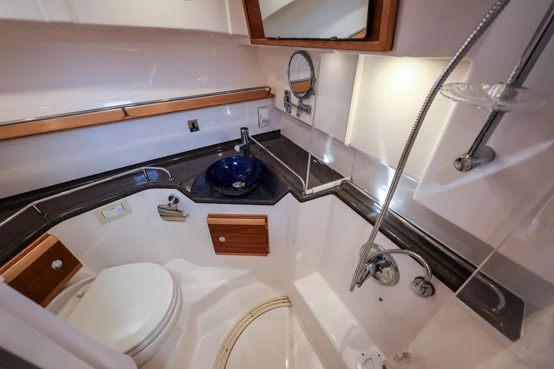 Slide: The Image of 2019 Cutwater C-302 Coupe bathroom with modern fixtures and elegant design. - 28