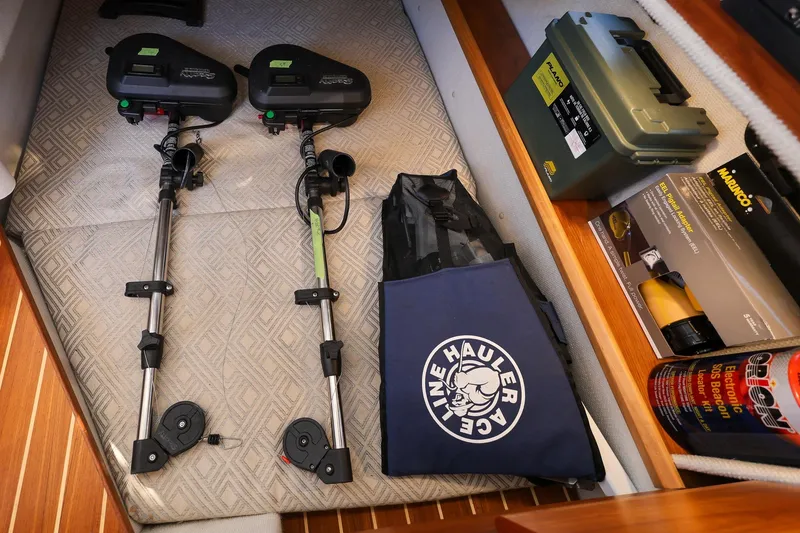 Slide: The Image of Storage area in a 2019 Cutwater C-302 Coupe with fishing gear and equipment. - 30