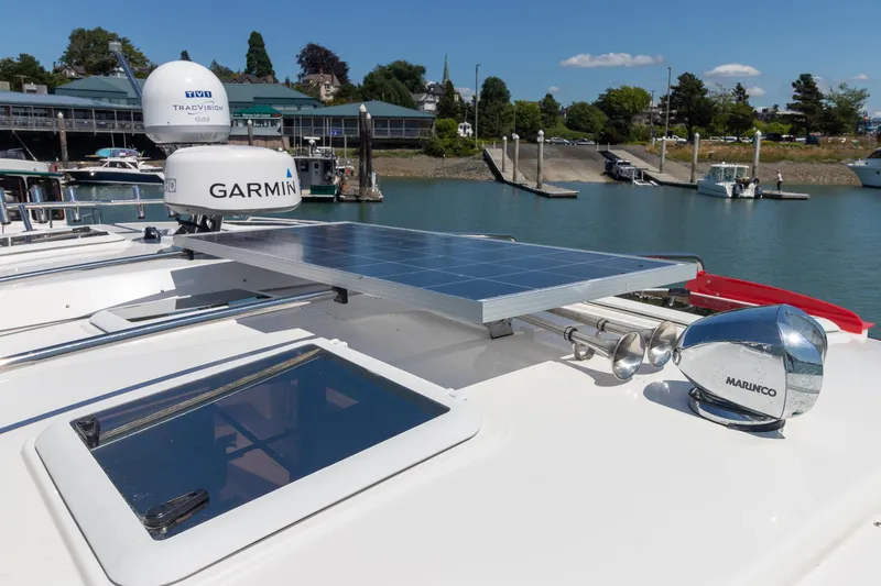 Slide: The Image of 2019 Cutwater C-302 Coupe with solar panel and Garmin equipment. - 34
