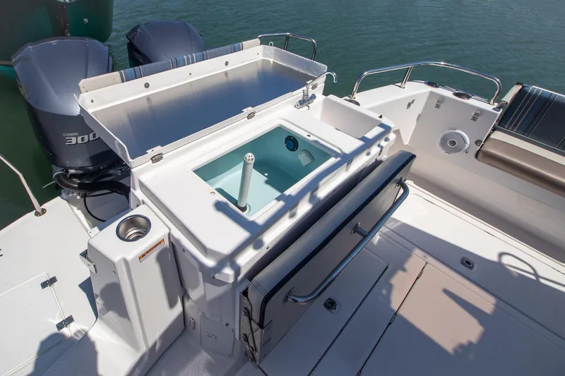 Slide: The Image of 2019 Cutwater C-302 Coupe boat with outboard motors. - 8