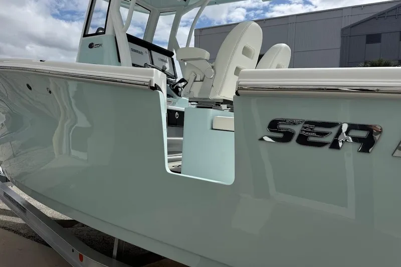 Slide: The Image of 2026 Sea Pro 265FLX Sandbar boat with sleek design and modern features. - 10
