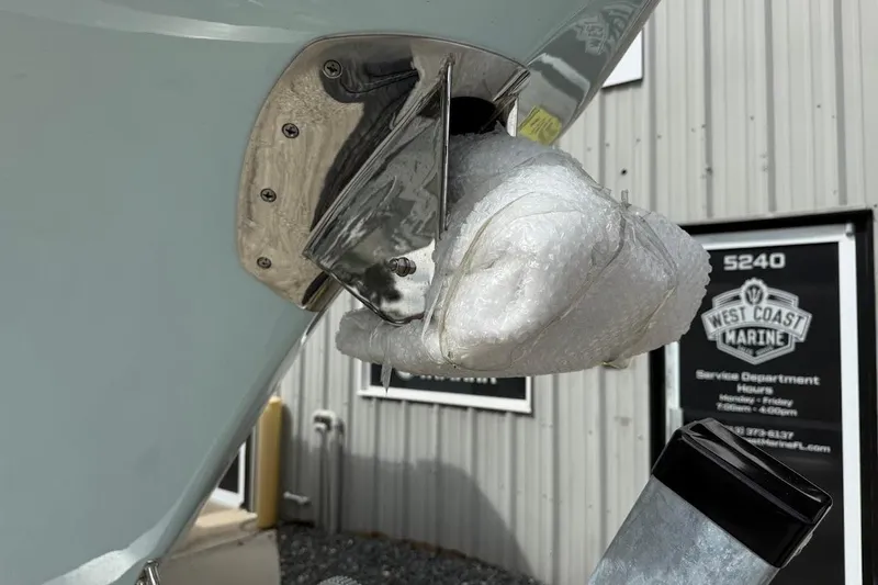 Slide: The Image of Close-up of a 2026 Sea Pro 265FLX Sandbar boat component wrapped in protective material. - 11