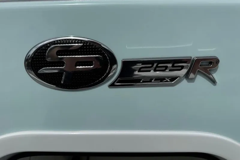 Slide: The Image of 2026 Sea Pro 265FLX Sandbar logo on light blue background. - 21