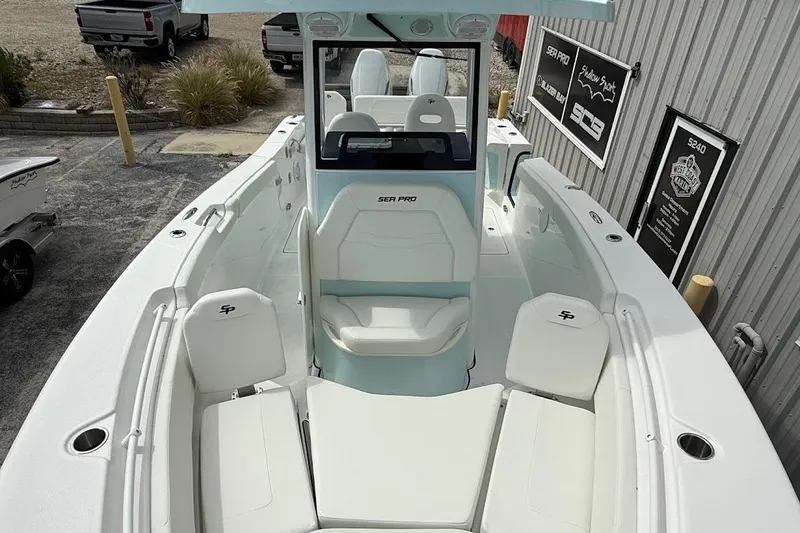 Slide: The Image of 2026 Sea Pro 265FLX Sandbar boat with spacious seating and modern design. - 25