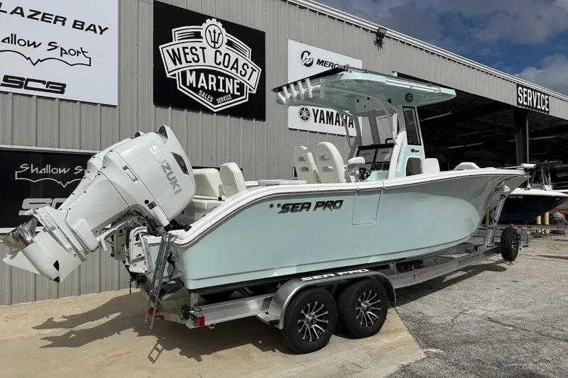 Slide: The Image of 2026 Sea Pro 265FLX Sandbar boat on trailer at West Coast Marine dealership. - 8