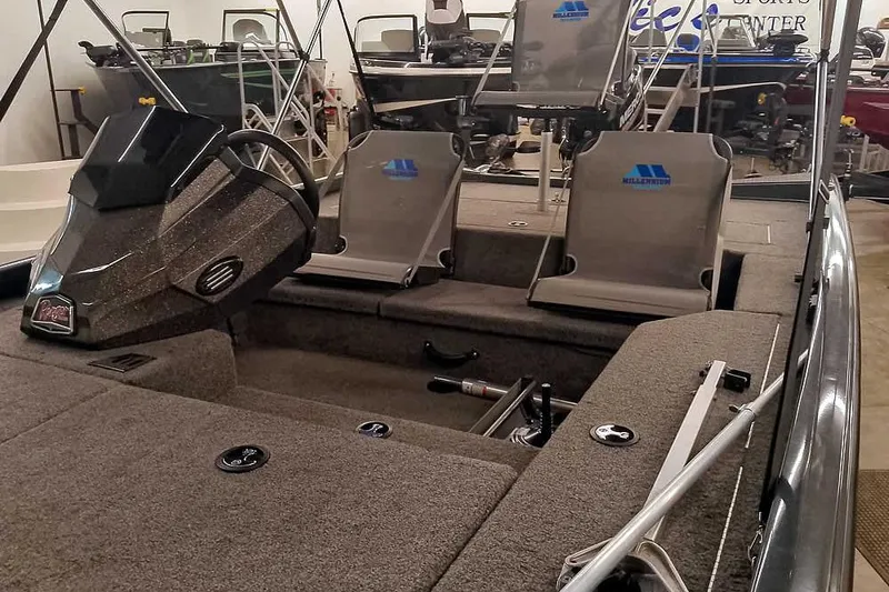 Slide: The Image of 2021 Ranger RT178 boat interior with steering wheel and seating in showroom. - 10