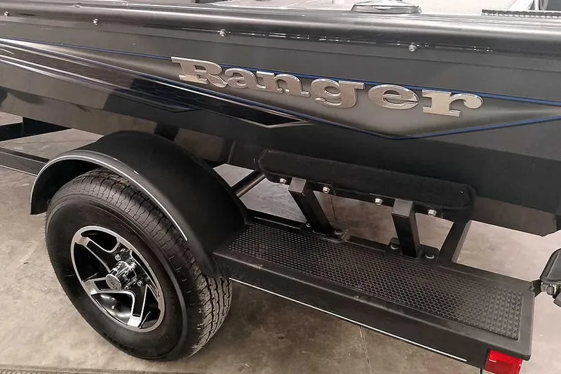 Slide: The Image of 2021 Ranger RT178 boat trailer with black finish and branded logo. - 12