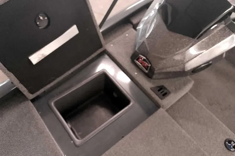 Slide: The Image of 2021 Ranger RT178 boat interior storage compartment and console detail. - 18