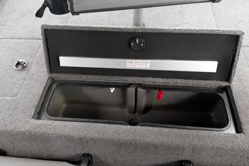 Slide: The Image of 2021 Ranger RT178 boat storage compartment with open lid, showcasing interior space. - 29