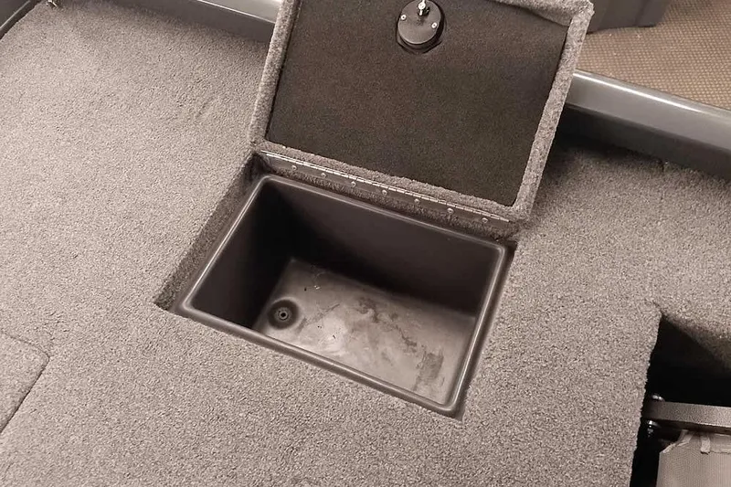 Slide: The Image of 2021 Ranger RT178 boat storage compartment with open lid, showcasing interior space. - 30