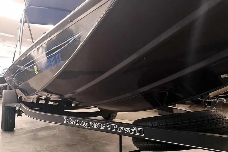 Slide: The Image of 2021 Ranger RT178 boat on Ranger Trail trailer in indoor setting. - 6