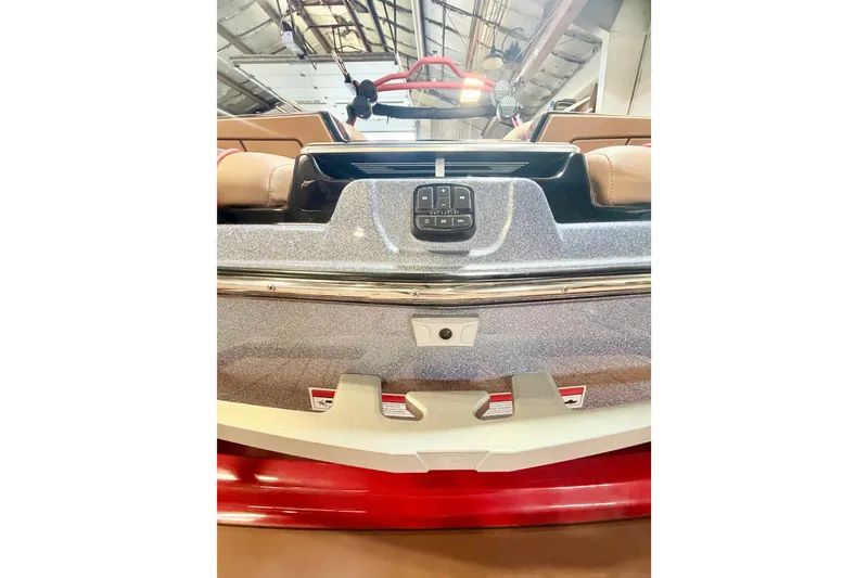 Slide: The Image of 2023 Malibu Wakesetter 23 LSV boat interior with control panel, showcasing luxury design. - 7