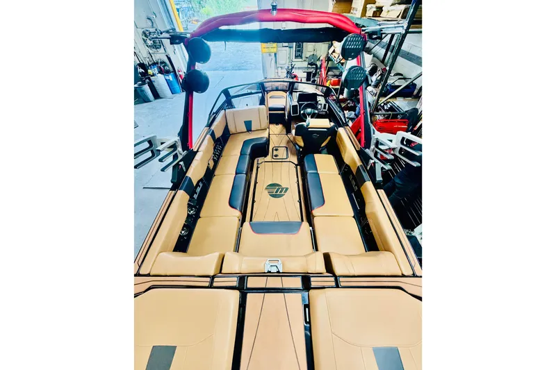 Slide: The Image of 2023 Malibu Wakesetter 23 LSV interior with tan seating and modern design. - 9